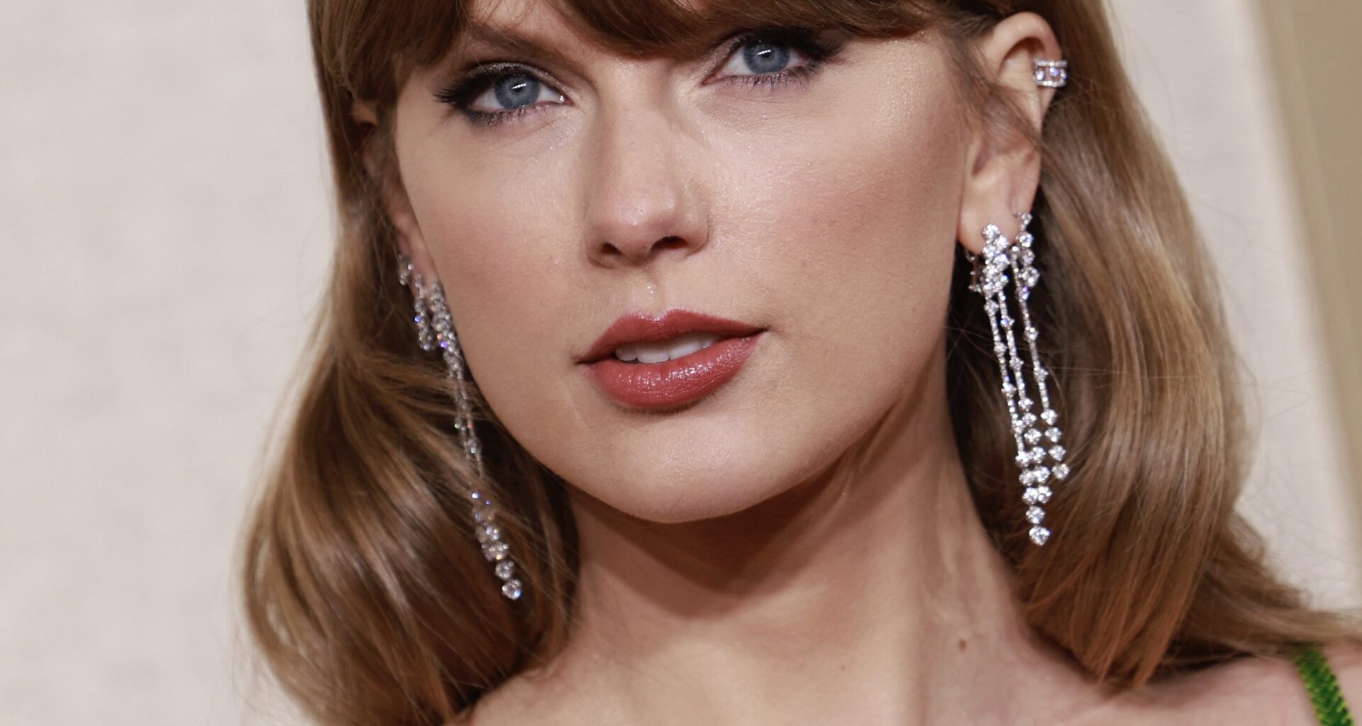 Taylor Swift at the 2024 Golden Globes in Natural Diamond Jewelry