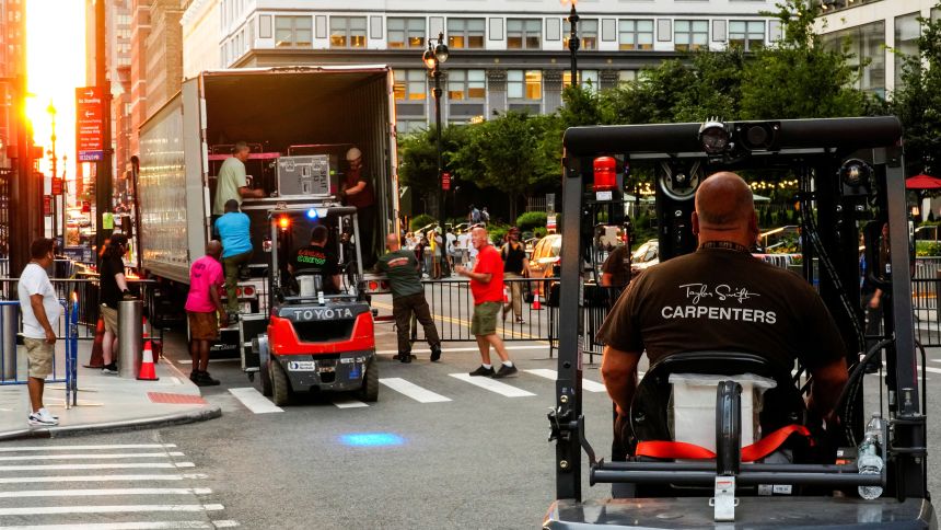 Workers unload equipment Tuesday from a truck at Madison Square Garden in New York.