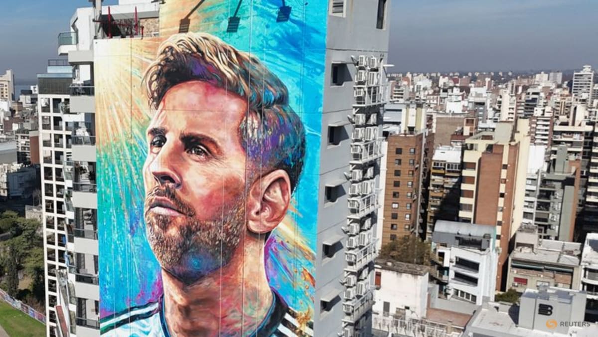 Artists restore gigantic Messi mural in his hometown