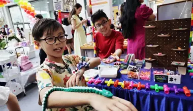 Lee Rui Qi with his 3D-printed animal figurines at Singapore Kidpreneurs at HarbourFront Centre.