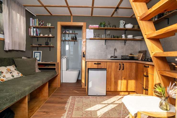The famed treehouse Airbnb for sale is part of a larger off-grid property for sale in Raglan. Photo / Supplied
