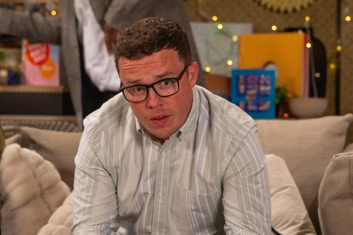 Vinny looks nervous in a scene from Emmerdale
