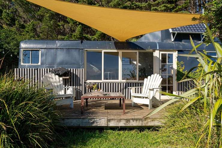 The famed treehouse Airbnb for sale is part of a larger off-grid property for sale in Raglan. Photo / Supplied