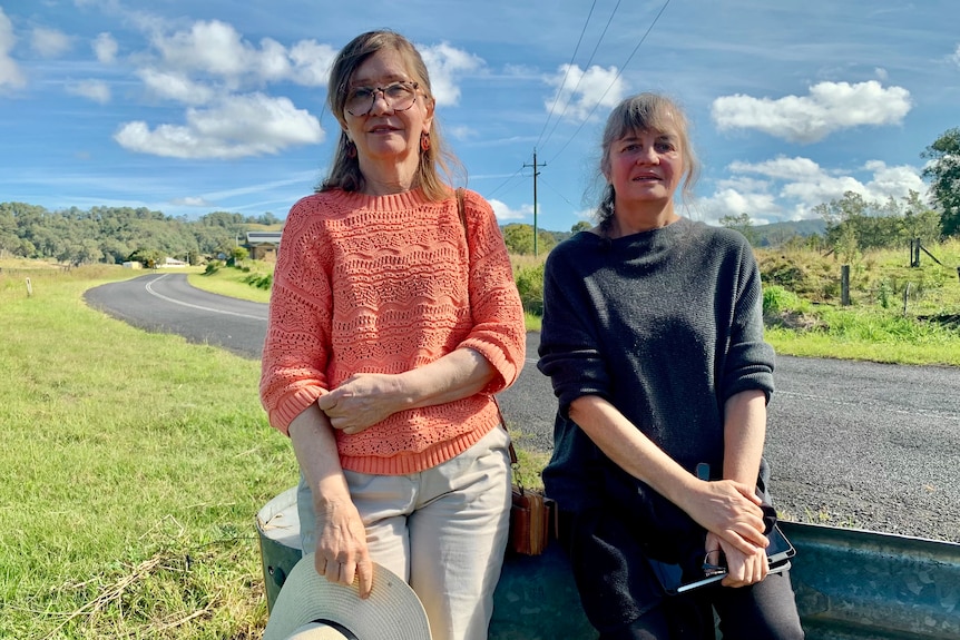 two women at road side