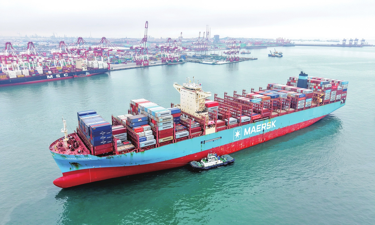A cargo ship loaded with foreign trade containers enters a port in Qingdao, East China’s Shandong Province, on July 16, 2026. Photo: VCG