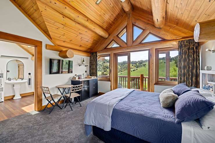 A six-bedroom log home in Ōkaihau, in the Far North, hit the market this year with an asking price of $2.55m. Photo / Supplied