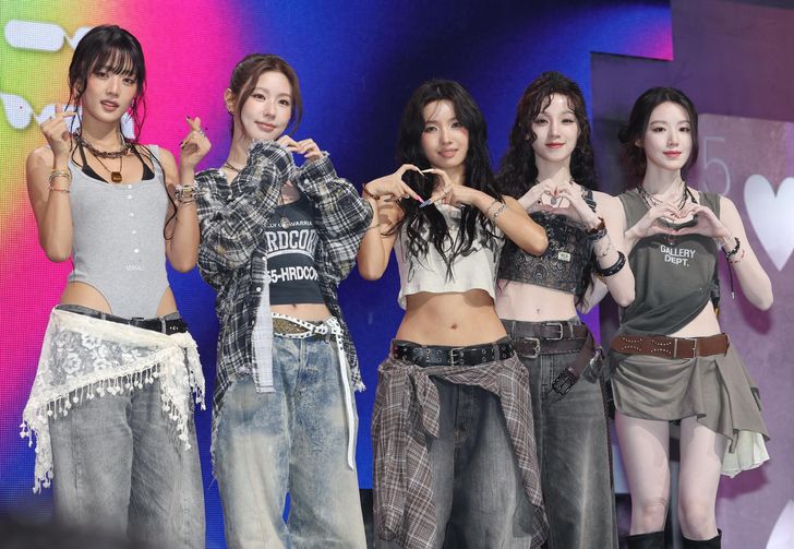 From left, K-pop girl group i-dle members Minnie, Miyeon, Soyeon, Yuqi and Shuhua pose during a press event for the group's ninth EP 'We made' release at Yes24 Live Hall in Seoul's Gwangjin District, Monday. Yonhap