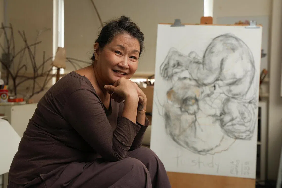Artist Dana Lam was inspired to pick up charcoal drawing by fellow artist Jimmy Ong’s work.