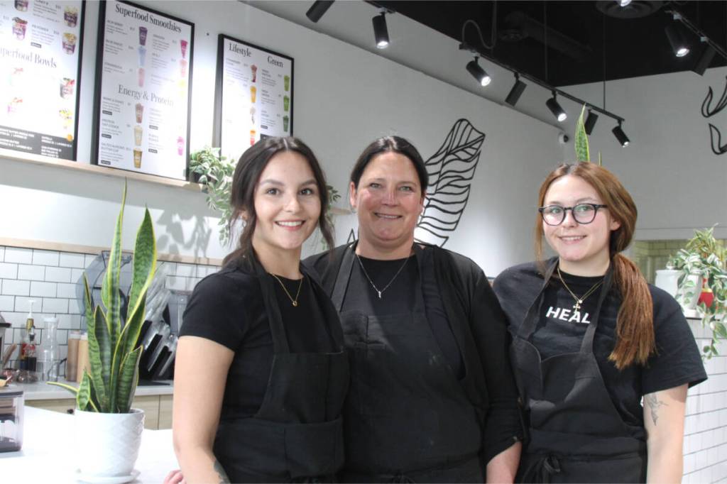 Mackenzie Belhumeur, owner of Red Deer&rsquo;s HEAL Wellness location, poses for a photo alongside her mother Tricia and sister Megan. (Photo by Sean McIntosh/Advocate staff)