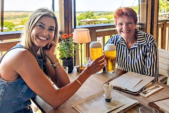 Holly Valance and Pauline Hanson having a beer in the UK.