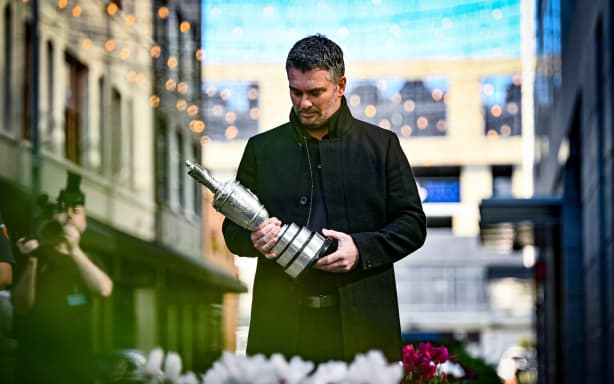 Ryan Fox holds the Claret Jug as he waits to attend the Public welcome home celebration for New Zealand golfer Ryan Fox on bringing the Claret Jug home after his historic Open Championship win.
Takutai Square, Auckland, New Zealand on Tuesday 28 July 2026. Photo: Alan Lee / Photosport