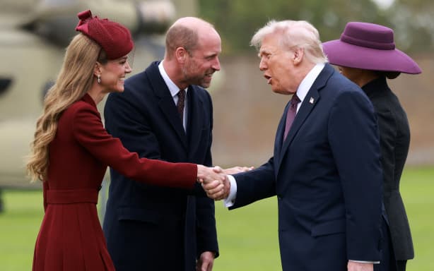 US President Donald Trump and First Lady Melania Trump are greeted by Britain's Prince William, Prince of Wales and Britain's Catherine, Princess of Wales, upon their arrival at the grounds of Windsor Castle, in Windsor, on September 17, 2025, for the start of a second State Visit. (Photo by Ian Vogler / POOL / AFP)