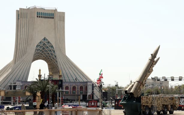 Iranian-made Zolfaghar missiles are displayed at Azadi Square in Tehran on July 24, 2026. Iran's army said on July 24 it carried out drone strikes against several American military facilities and bases in Bahrain and Jordan in retaliation for the latest US attacks against the Islamic republic. (Photo by AFP) /
