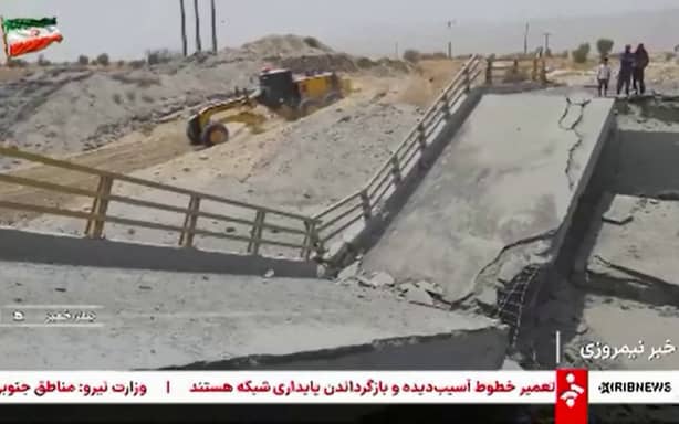 This screen grab taken from video footage broadcast by Iran's IRINN state television network and made available via AFPTV on July 17, 2026, shows what the network says is the aftermath of overnight US strikes on a bridge in Bandar Khamir County, near the Strait of Hormuz. A month after the two sides agreed a memorandum of understanding aimed at ending the conflict that began in February, Iran accused US forces of hitting civilian and energy infrastructure on July 17 including an airport, a railway station and two bridges, with state media reporting at least eight dead and 20 wounded in overnight attacks. (Photo by IRINN / AFP) /