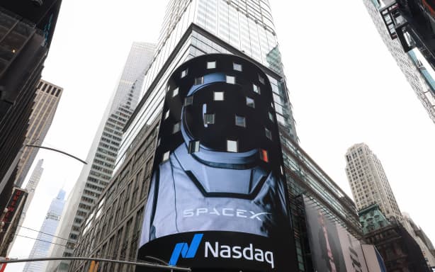 A view of the Nasdaq MarketSite after SpaceX company executives rang the opening bell to celebrate the launch of SpaceX’s initial public offering (IPO) in New York on June 12, 2026. Elon Musk's SpaceX begins trading on the Nasdaq exchange on Friday with the biggest initial public offering in history expected to make the polarizing entrepreneur the world's first trillionaire. The company priced more than 555 million shares at $135 each in a filing with the US markets regulator on Thursday, placing SpaceX in the top 10 of Wall Street's biggest companies with a valuation of just under $1.8 trillion -- ahead of Tesla, Facebook-owner Meta and Walmart.