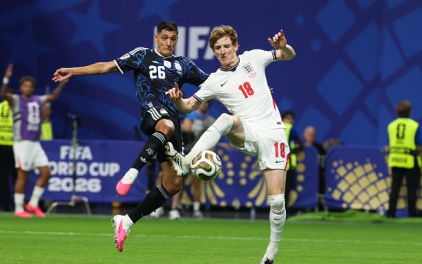 Argentina's defender #26 Nahuel Molina and England's forward #18 Anthony Gordon fight for the ball during the 2026 World Cup football tournament semi-final match between England and Argentina at the Atlanta Stadium in Atlanta on July 15, 2026. (Photo by Odd ANDERSEN / AFP)