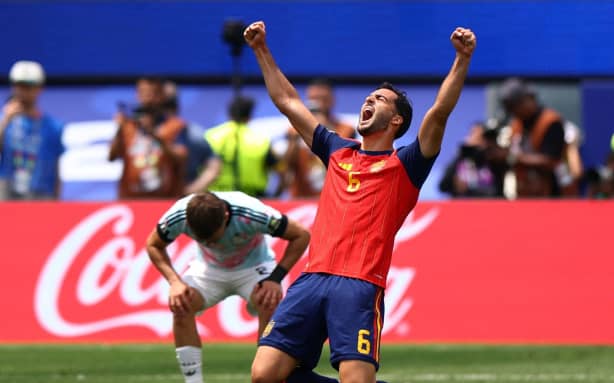 Spain's Mikel Merino celebrates after the match against Belgium.