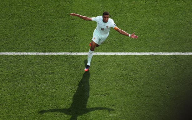 Kylian Mbappé celebrates scoring his team's first goal during the quarterfinal against Morocco last week. J