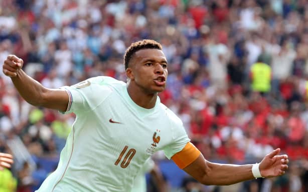 France's forward #10 Kylian Mbappe celebrates scoring his team's first goal during the 2026 World Cup football tournament quarter-final match between France and Morocco at Boston Stadium in Foxborough on July 9, 2026. (Photo by Odd ANDERSEN / AFP)