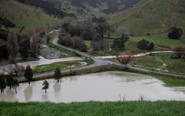 A flooded White Rock Road and Lagoon Hill Road intersection