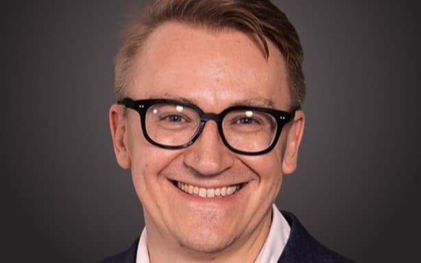 A professional headshot of Cotality head of data Craig Dargusch.