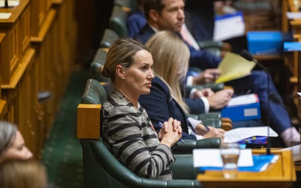 National Party MP Nicola Grigg sits in the House during Question Time.