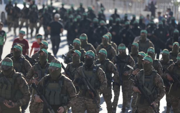 Fighters from the Ezz-Al Din Al-Qassam Brigades, the armed wing of the Palestinian Hamas movement, during an anti-Israel military show in Gaza City, on 20 July, 2022.
