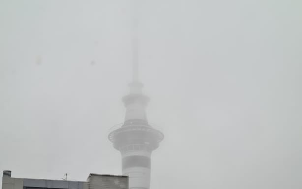 Auckland City's Sky Tower disappearing behind fog on 23 September, 2023.