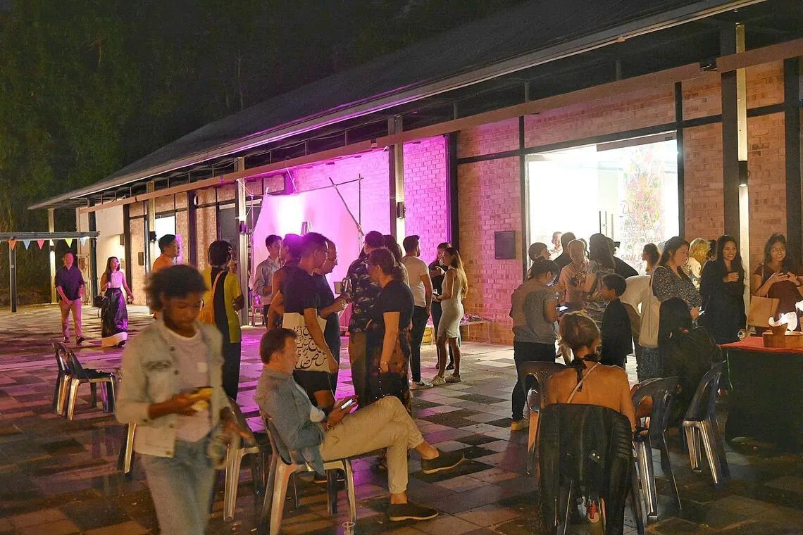 ‘A sense of freedom’: Visitors at block 47 Malan Road in Gillman Barracks during the Art After Dark event during Singapore Art Week in 2023.