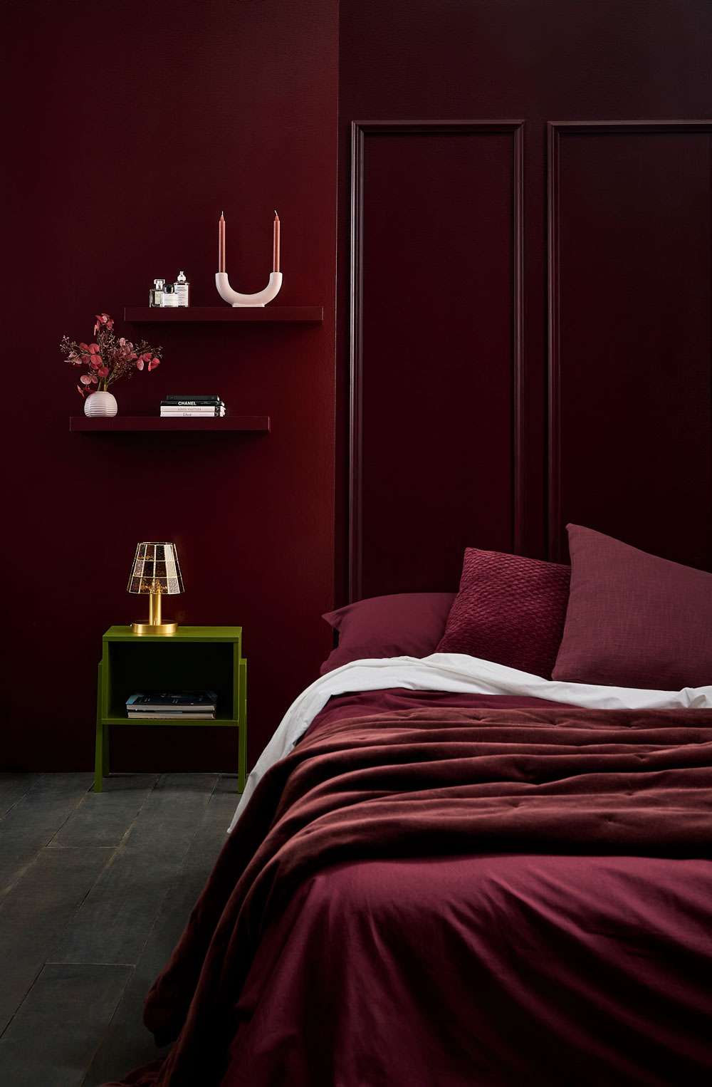 Keeping rooms uncluttered and simple allows the red to shine rather than compete. Wall and planter in Resene Lonestar, floor and vase in Cinder, mask decor in Vesuvius. Chair from Good Form, rug from Baya. Project Amber Armitage. Image Wendy Fenwick.