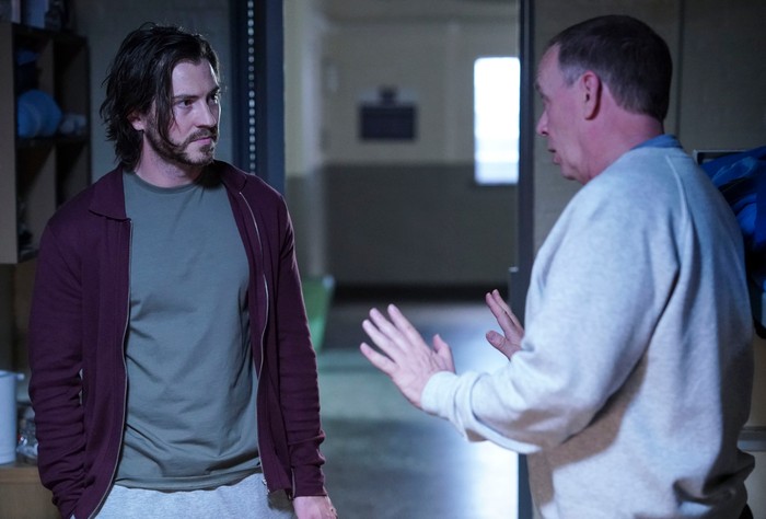 568603,TITLE:Eastenders Ian and Gray talking in a cell in EastEnders