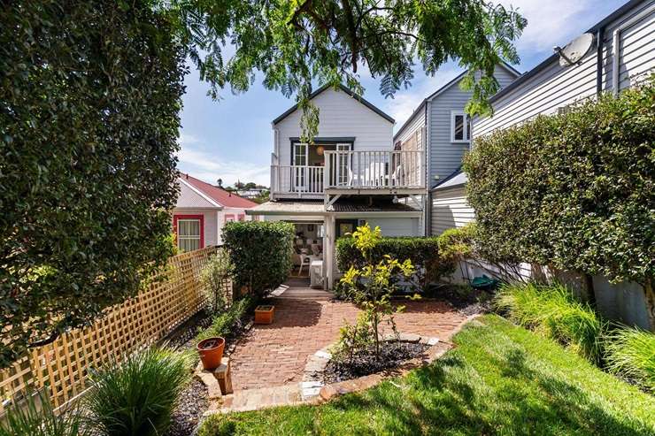 The three-bedroom villa for sale at 127 John Street, in Auckland's Ponsonby. It is heading to auction with a declared reserve of under <img.3m. Photo / Supplied