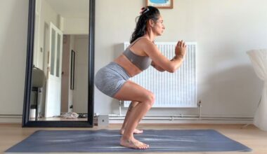 Sam performing squat at home on yoga mat