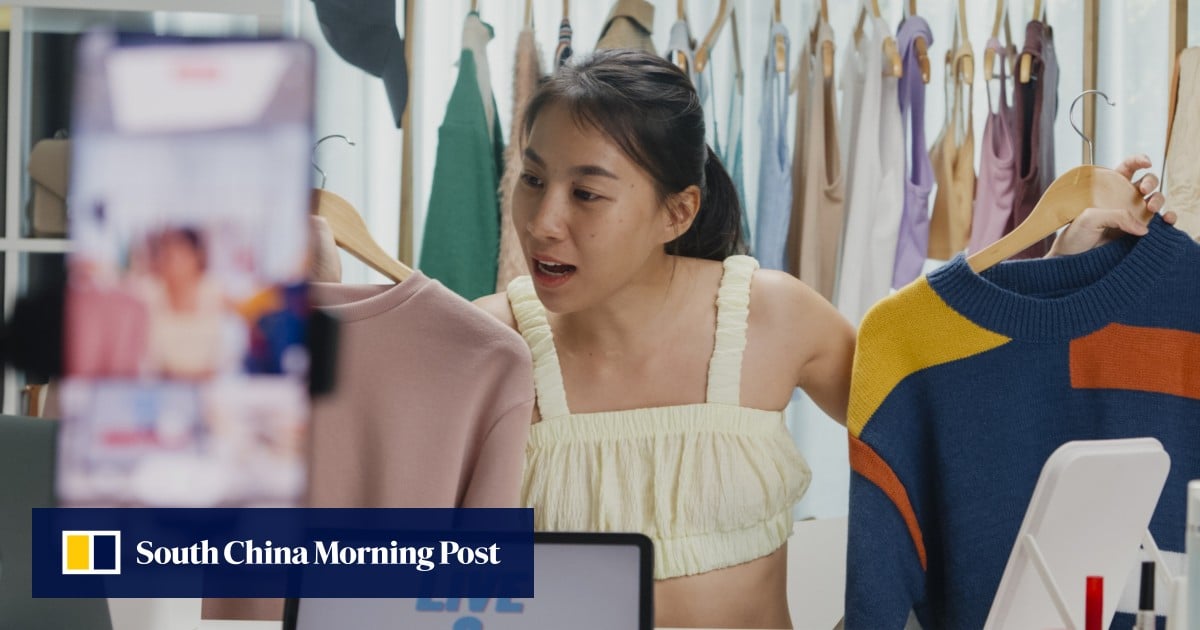 Singapore’s young workers cling to side hustles to survive the AI age: ‘it’s exhausting’