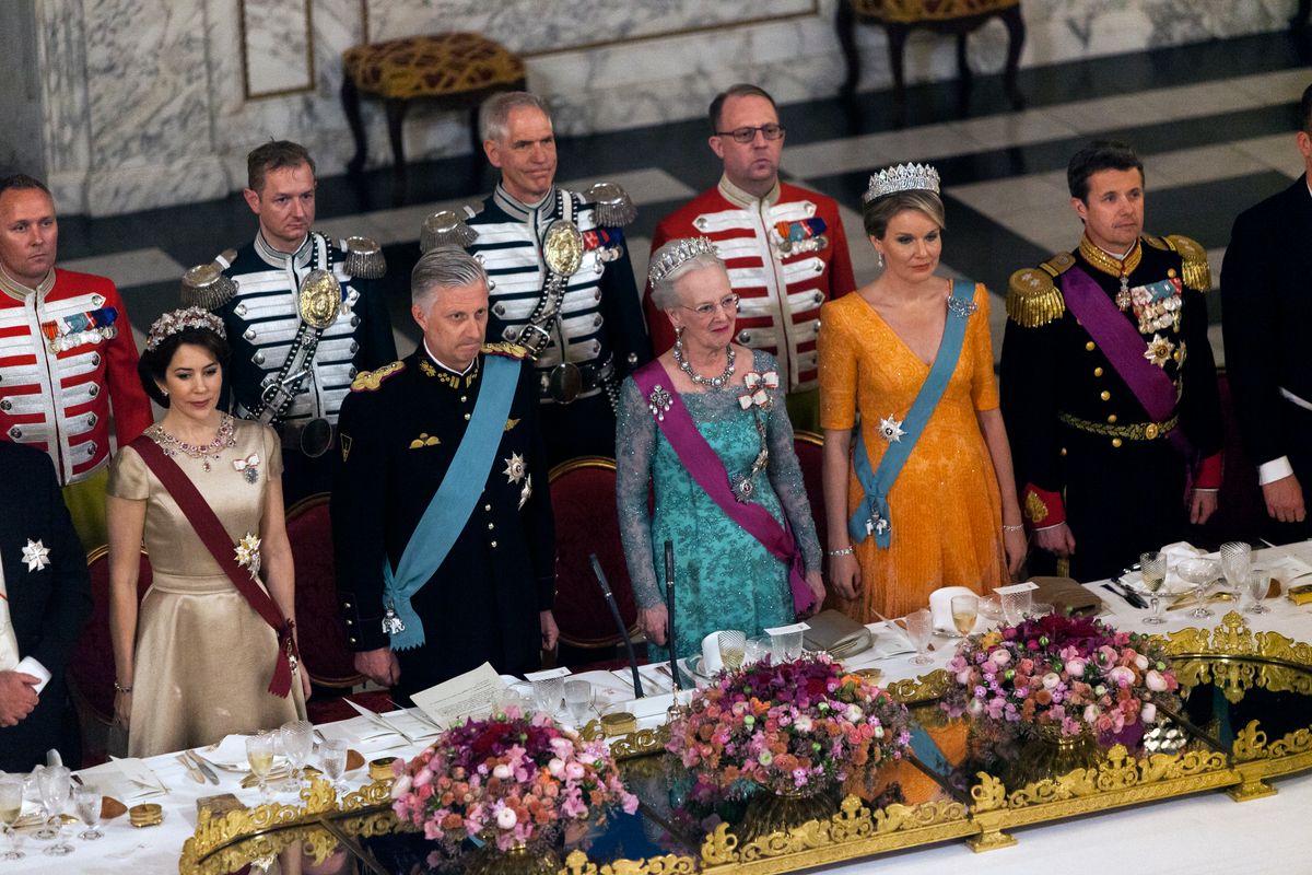 The royal Danish and royal Belgian family stands during the national anthem at the State Dinner at Christiansborg  on March 28, 2017 in Copenhagen