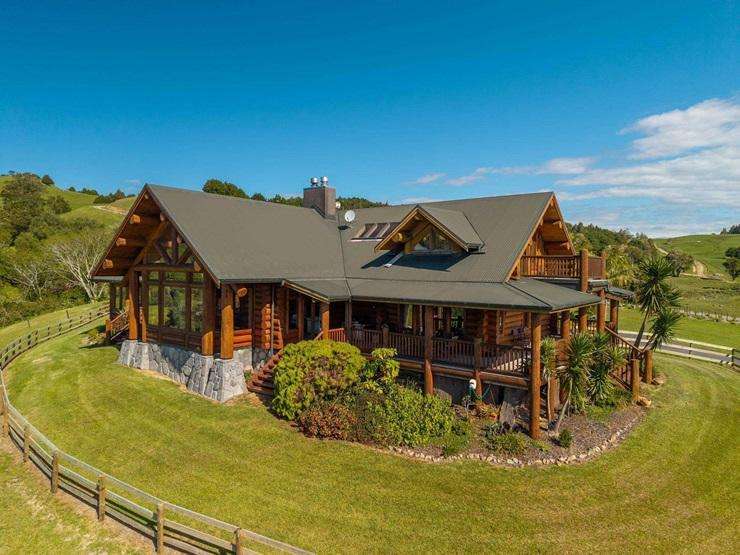 A six-bedroom log home in Ōkaihau, in the Far North, hit the market this year with an asking price of $2.55m. Photo / Supplied