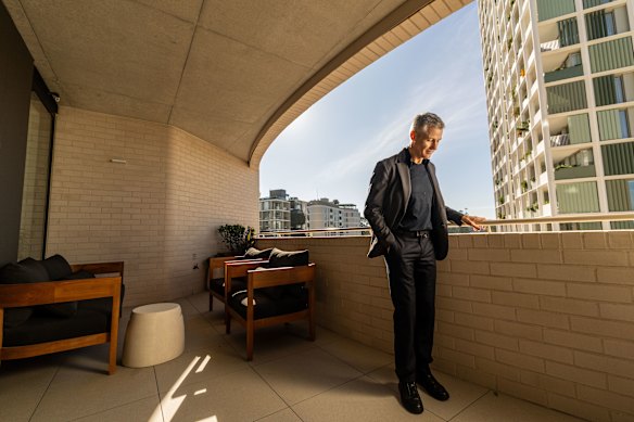 Architect William Smart, the founder of Smart Design Studio, feeling the joy of Lacebark’s solid brick balconies that provide privacy and protection.