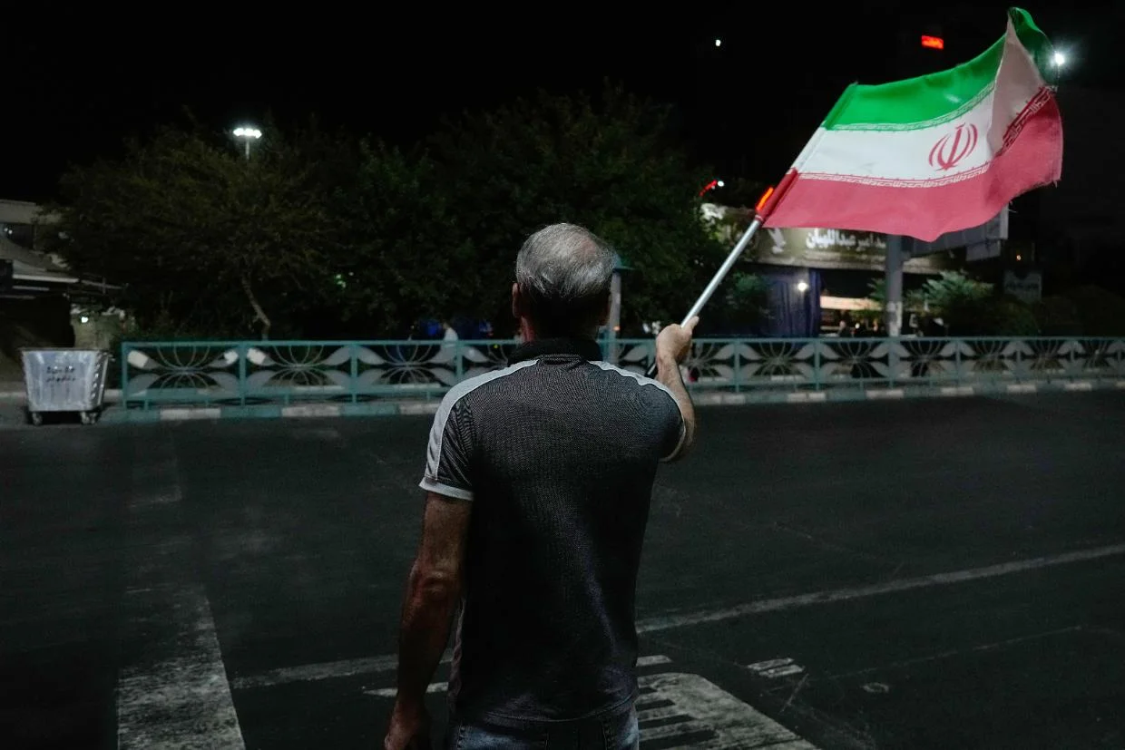 Iran reports new attacks on military targets on its largest island near the Strait of Hormuz - Stuff