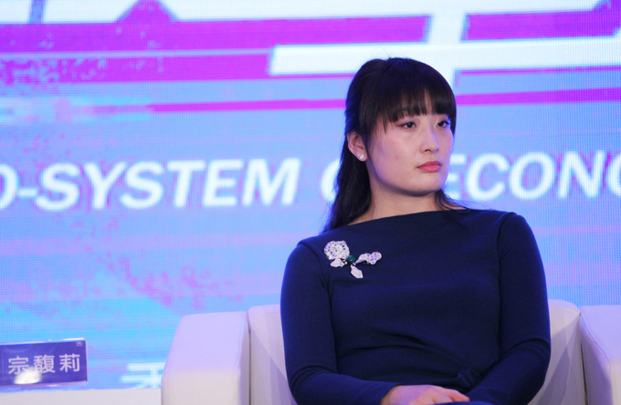Kelly Zong, daughter of Wahaha Group founder Zong Qinghou, attends the 2015 NetEase Annual Economist Conference in Beijing, China, December 2014. Photo by Imaginechina via AFP