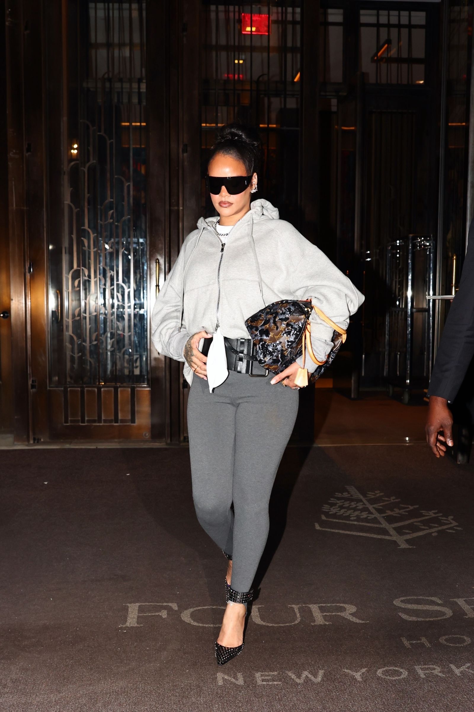 EXCLUSIVE Rihanna steps out to hit the club after leaving the Four Seasons Hotel