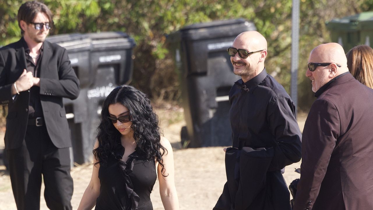 Charli XCX and George Daniel Prove Wedding Guest Dressing Doesn’t Have To Compromise Personal Style