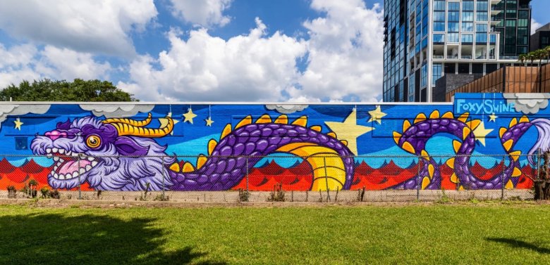 FoxySwine's dragon mural in Midtown, reimagined as "Dancing Dragon" on the Atlanta AR mural tour.