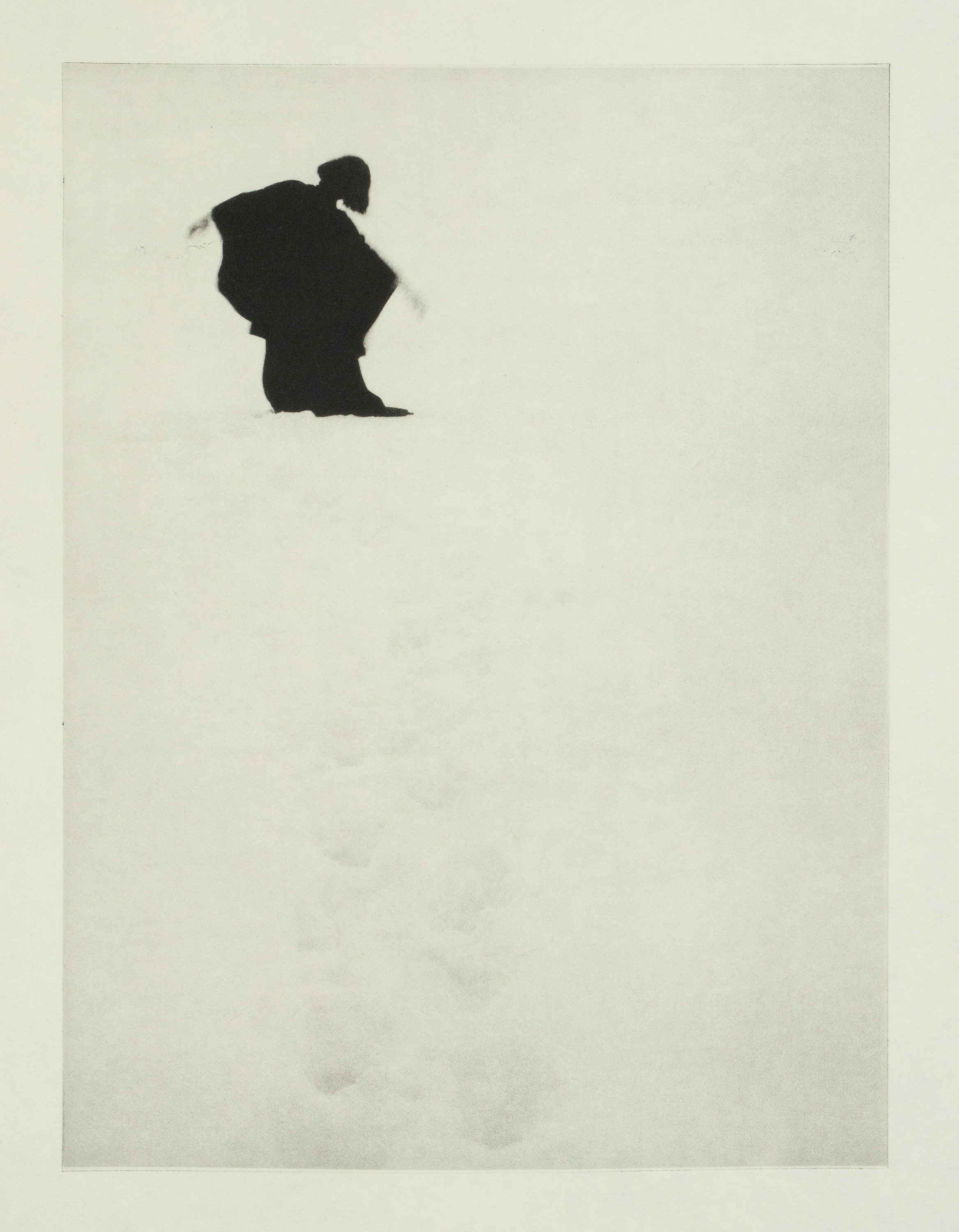 Black and white photograph of a small silhouetted figure with outstretched arms in the upper left of an otherwise empty white frame, with faint footprints visible in the snow below.