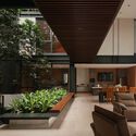 © Ernest Theofilus Beyond The Courtyard House / RCAB Studio - Interior Photography, Living Room, Chair, Courtyard