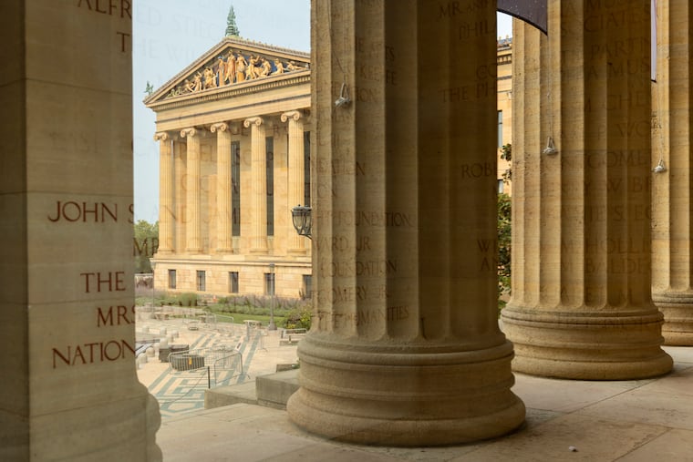 The exterior of the Philadelphia Museum of Art is reflected through the windows of the front entrance lobby on Tuesday, July 14, 2026, in Philadelphia.