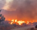 Firefighters tackle deadly wildfires in southern Spain