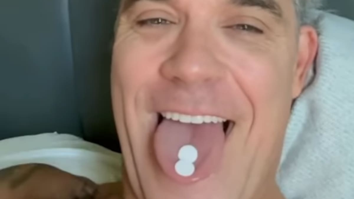 Robbie Williams responds to viral clip after speculation over white object and drugs