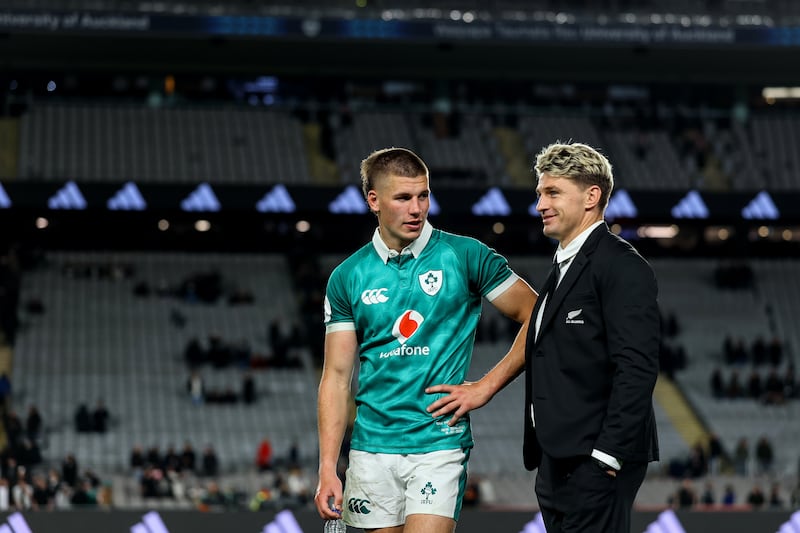 Ireland's Sam Prendergast with New Zealand's Beauden Barrett after the match. Photograph: Ben Brady/Inpho
