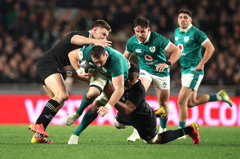 Jack Conan of Ireland is tackled against the All Blacks at Eden Park. Photograph: Phil Walter/Getty