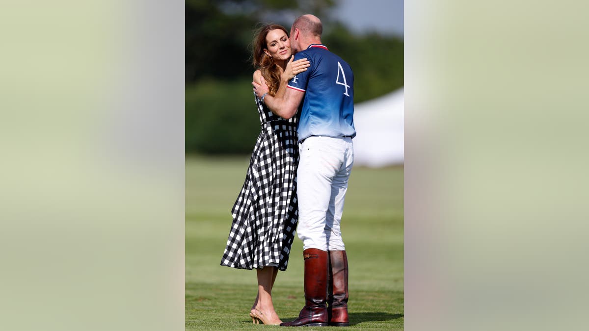 Catherine, Princess of Wales kisses Prince William during the polo cup presentation in Windsor, England.